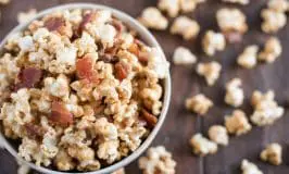 Maple Bacon Popcorn. Sweet maple syrup and savory bacon combine in this heavenly popcorn recipe that is sure to make your taste buds shout for joy!