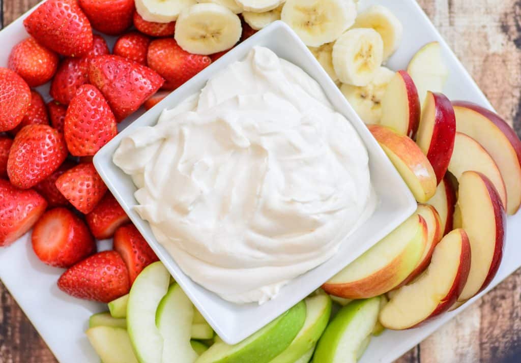 4 Ingredient Yogurt Fruit Dip. This healthy and delicious recipe is the perfect compliment to any fruit plate. Made with 3 simple and pure ingredients this fruit dip recipe is sure to be a hit no matter where you serve it!